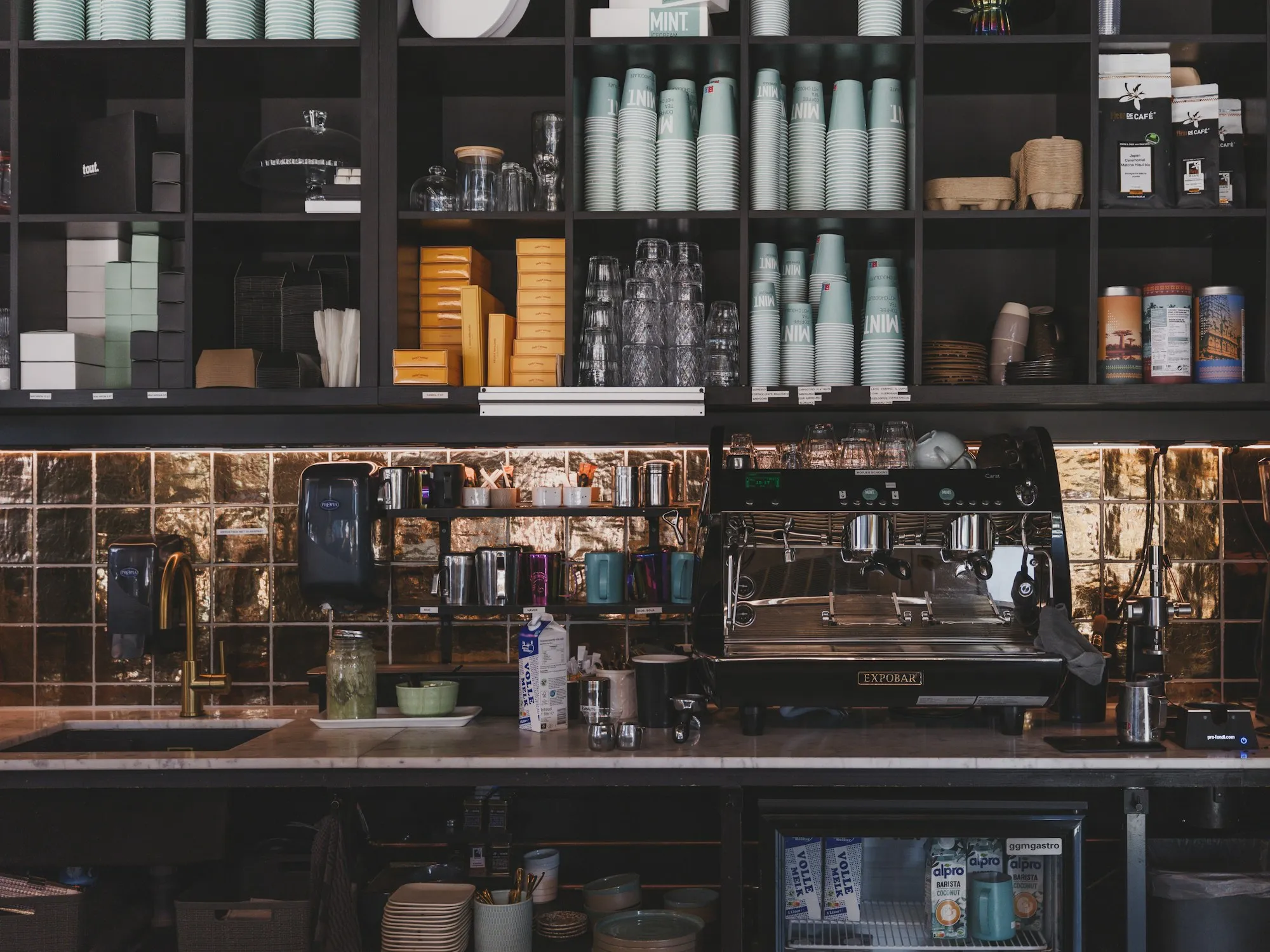 Shelves stocked with bottled goods in a trading store